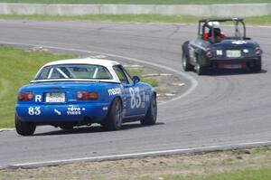 Zane Emstad's F Production Datsun SPL311 and Greg Blaser's Spec Miata Mazda Miata