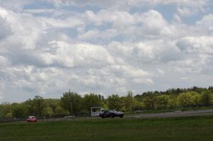 Sean Maloney's STO Chevy Corvette and Shannon Ivey's ITE Porsche 911SC head through turn 4