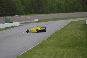 Dan Hedley's Van Diemen RF96 Formula Continental spins and tweaks the wing on a barrier