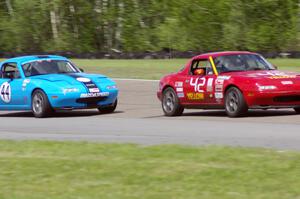 Greg Youngdahl's ITA Mazda Miata and Jerry Szykulski's Spec Miata Mazda Miata