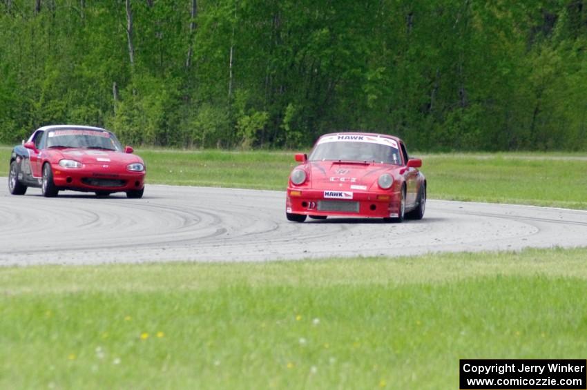 Shannon Ivey's ITE Porsche 911SC and Tom Kraft's Spec Miata Mazda Miata