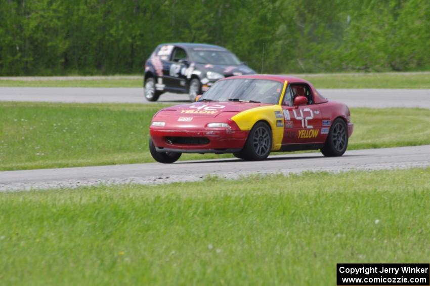 Greg Youngdahl's ITA Mazda Miata and David Daly's SCC VW Rabbit