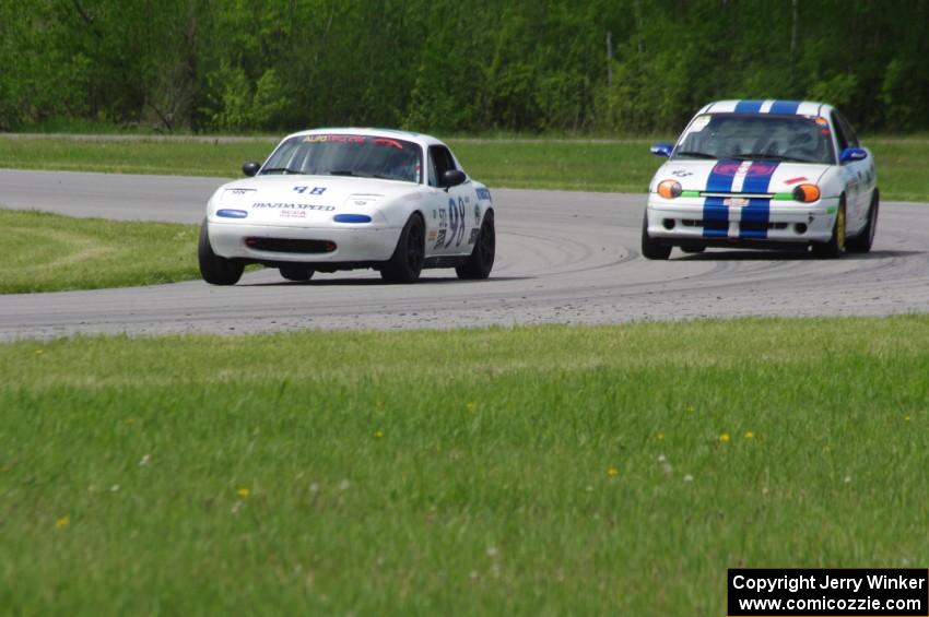 Andrew Wolff's STL Mazda Miata and John Glowaski's ITA Dodge Neon ACR