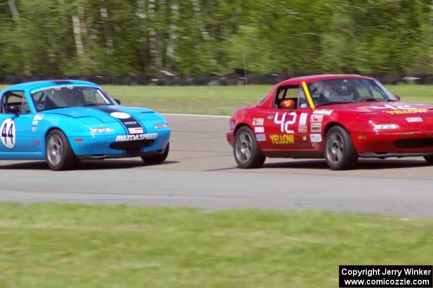 Greg Youngdahl's ITA Mazda Miata and Jerry Szykulski's Spec Miata Mazda Miata