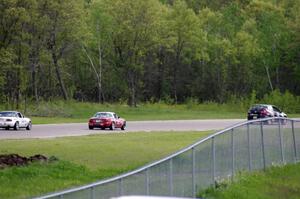 David Daly's SCC VW Rabbit, Lon Blaser's Spec Miata Mazda Miata and Craig Silver's Spec Miata Mazda Miata