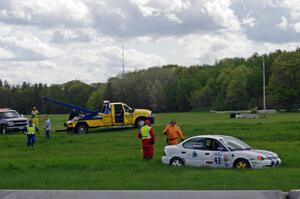 John Glowaski's ITA Dodge Neon ACR gets picked up after DNF'ing the race