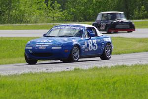 Greg Blaser's Spec Miata Mazda Miata and Terry Orr's GTL Austin Mini-Cooper