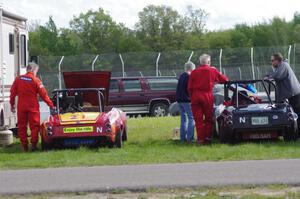 Don Haaversen's E Production Datsun 2000 and Zane Emstad's F Production Datsun SPL311 in the paddock