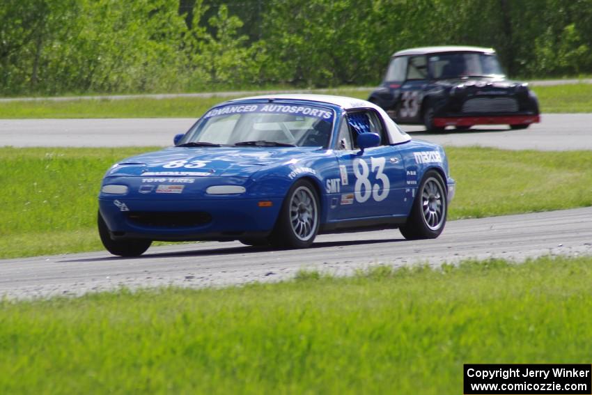 Greg Blaser's Spec Miata Mazda Miata and Terry Orr's GTL Austin Mini-Cooper