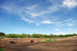 Cars navigate the course slowly before the next set of runs.