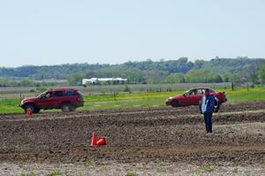 Peter Battle's SA Subaru Impreza is pulled off-course by Dan Drury's PA Jeep Grand Cherokee