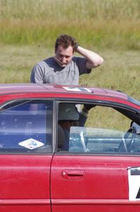 Starter Tim Anderson talks to Kerry Freund in his SA Subaru Impreza 2.5RS at the start line