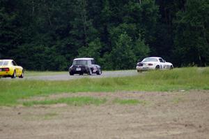 Ray Yergler's ITA Mazda Miata, Terry Orr's GTL Austin Mini-Cooper and Tim Homes' E Production Datsun 240Z