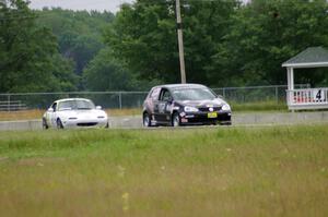 David Daly's SCC VW Rabbit and Dan Corgard's Spec Miata Mazda Miata