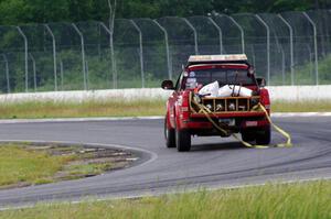 Jim Anderson's Dodge Ram Pickup goes onto the track for an emergency