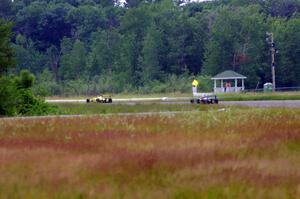 Steve Thomson's Van Diemen RF02 and Chris Miller's Van Diemen RF06 Formula Continentals at turns 7/8