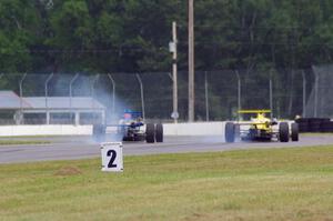 Chris Miller's Van Diemen RF06 and Steve Thomson's Van Diemen RF02 Formula Continentals brake hard for turn 12