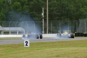 Chris Miller's Van Diemen RF06 and Steve Thomson's Van Diemen RF02 Formula Continentals brake hard for turn 12
