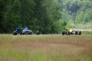 Steve Thomson's Van Diemen RF02 and Chris Miller's Van Diemen RF06 Formula Continentals at turn 6