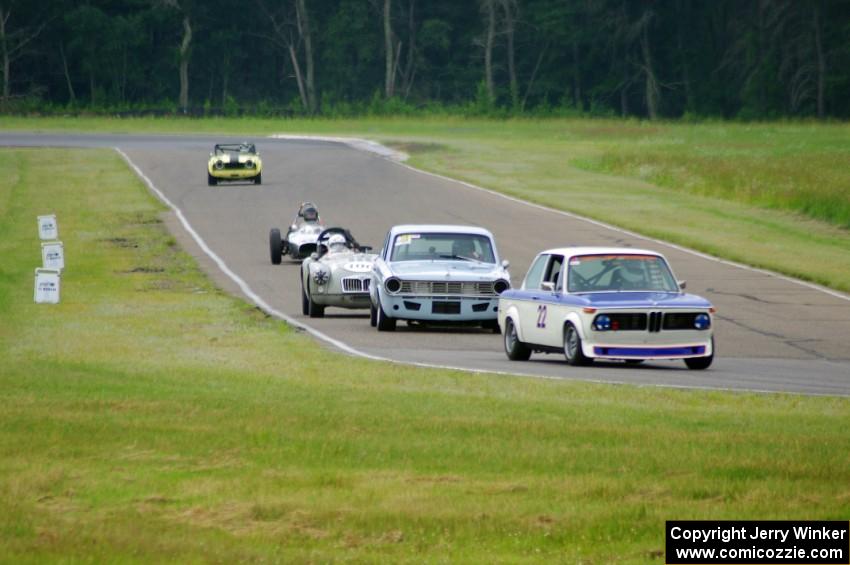 Tom Moran's BMW 2002, Greg Meyers' Dodge Dart, Mark Brandow's MGA, John Hertsgaard'sFormula Junior and John Hagen's Triumph TR-4