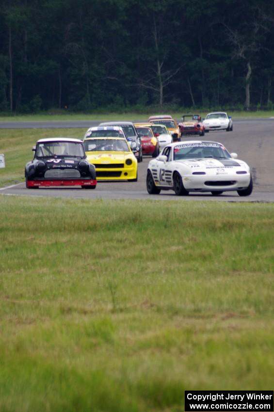 Ray Yergler's ITA Mazda Miata, Terry Orr's GTL Austin Mini-Cooper and Tim Homes' E Production Datsun 240Z, etc.