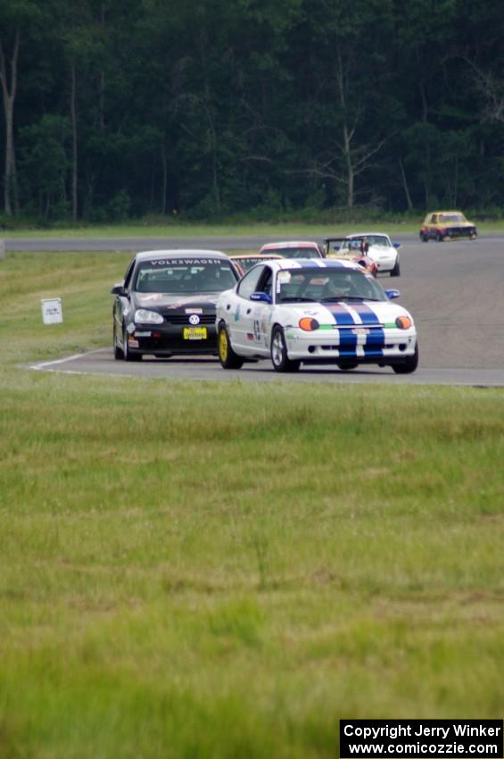 John Glowaski's ITA Dodge Neon ACR and David Daly's SCC VW Rabbit, etc.