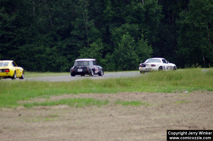 Ray Yergler's ITA Mazda Miata, Terry Orr's GTL Austin Mini-Cooper and Tim Homes' E Production Datsun 240Z