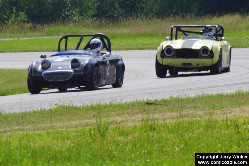 Phil Schaefer's Austin-Healey Sprite and John Hagen's Triumph TR-4