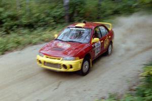 Dennis Martin / Kim DeMotte Mitsubishi Lancer Evo IV on Halverson Lake, SS1.