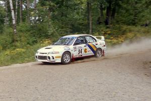 Pete Lahm / Bill Westrick Mitsubishi Lancer Evo IV on Halverson Lake, SS1.