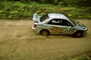 Robert Borowicz / Mariusz Malik Subaru WRX on Halverson Lake, SS1.