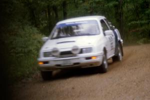 Colin McCleery / Nancy McCleery Ford Merkur XR4Ti on Halverson Lake, SS1.