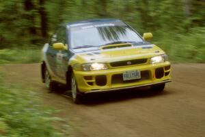 Joan Hoskinson / Rob Bohn Subaru Impreza 2.5RS on Halverson Lake, SS1.