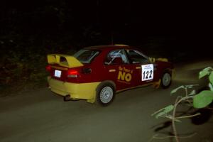 Dennis Martin / Kim DeMotte Mitsubishi Lancer Evo IV on SS4, Blue Trail.