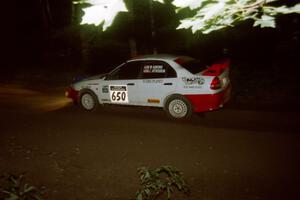 Mark Adkins / Jeff Aitkins Mitsubishi Lancer Evo IV on SS4, Blue Trail.