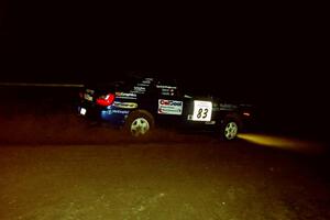 Mark Utecht / Jeff Secor Subaru WRX at night on SS8, Flying Finnish.