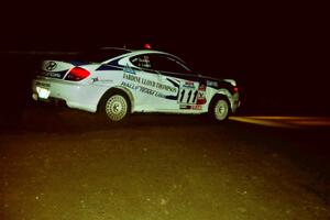 John Lloyd / Pauline Gullick Hyundai Tiburon at night on SS8, Flying Finnish.