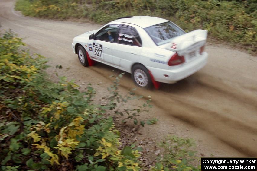 Chris Gilligan / Joe Petersen Mitsubishi Lancer Evo IV on Halverson Lake, SS1.