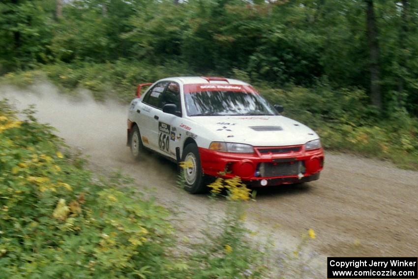 Mark Adkins / Jeff Aitkins Mitsubishi Lancer Evo IV on Halverson Lake, SS1.