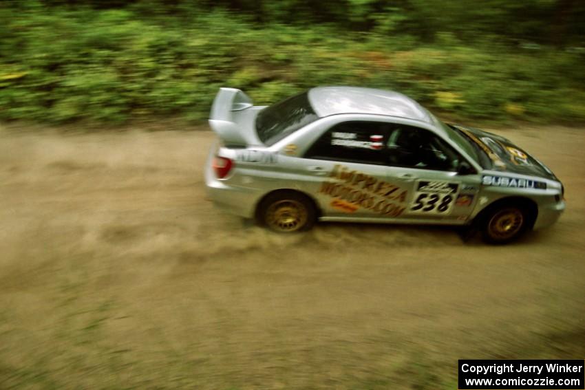 Robert Borowicz / Mariusz Malik Subaru WRX on Halverson Lake, SS1.