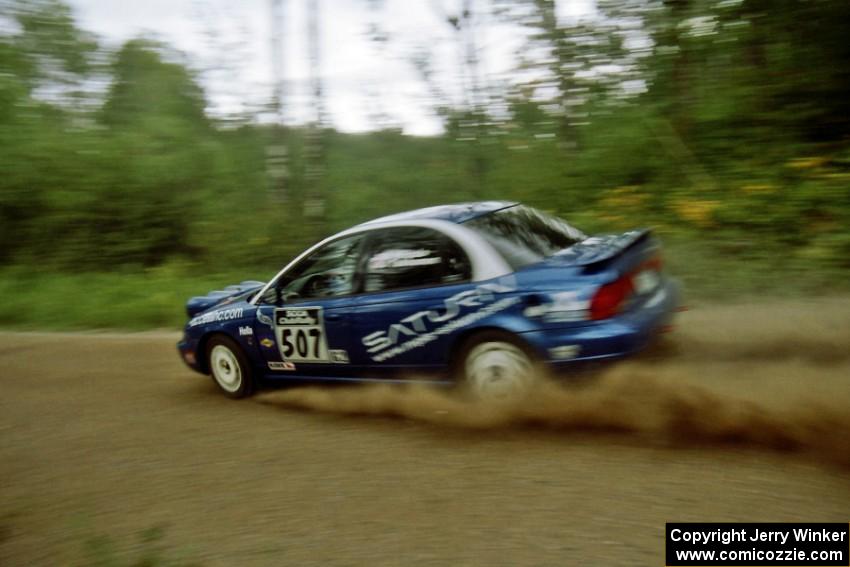 Micah Wiitala / Jason Takkunen Saturn SL2 on Halverson Lake, SS1.