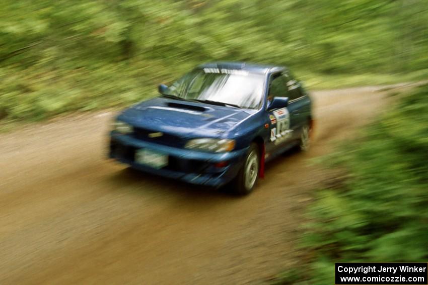 Bob Olson / Ryan Johnson Subaru 2.5 RS on Halverson Lake, SS1.