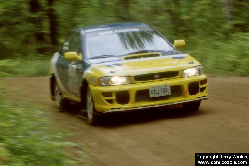 Joan Hoskinson / Rob Bohn Subaru Impreza 2.5RS on Halverson Lake, SS1.