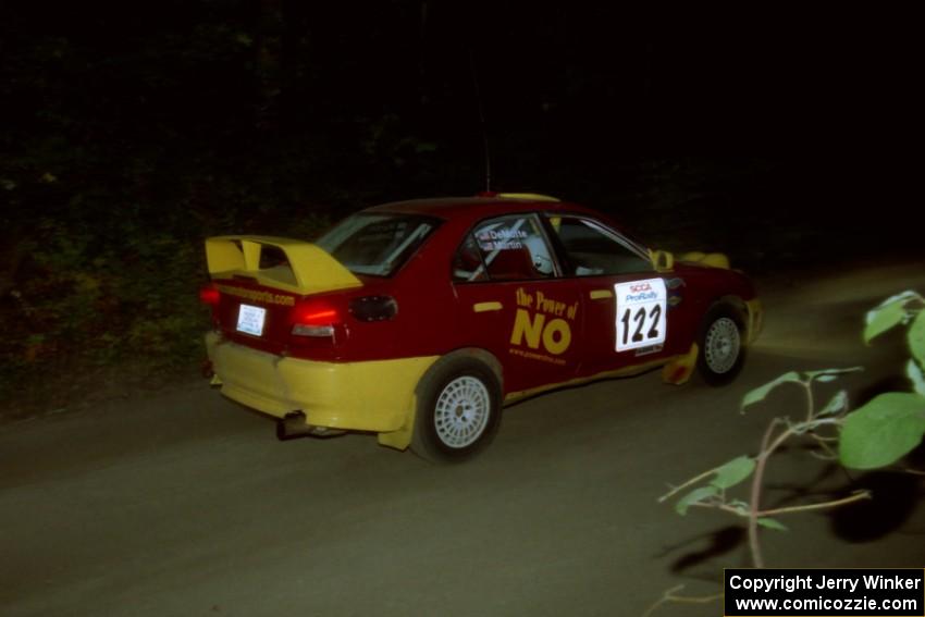 Dennis Martin / Kim DeMotte Mitsubishi Lancer Evo IV on SS4, Blue Trail.