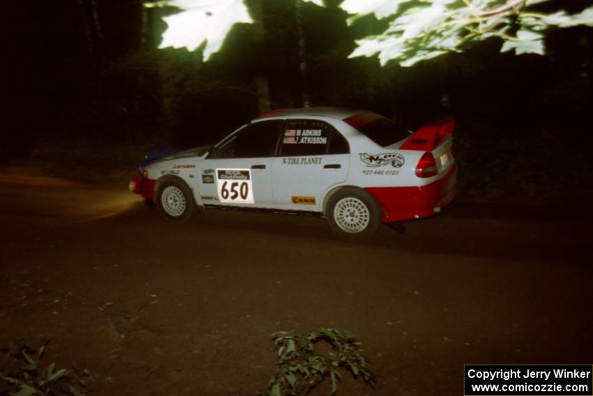 Mark Adkins / Jeff Aitkins Mitsubishi Lancer Evo IV on SS4, Blue Trail.