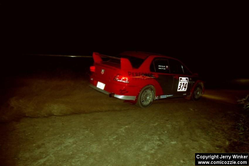 Leon Styles / John Dillon Mitsubishi Lancer Evo VII at night on SS8, Flying Finnish.