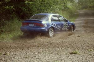 Micah Wiitala / Jason Takkunen Saturn SL2 at the SS9 (Heart Lake) spectator area.