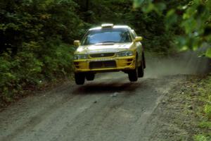 Lauchlin O'Sullivan / Scott Putnam Subaru Impreza catches air on a jump on SS13, Indian Creek.