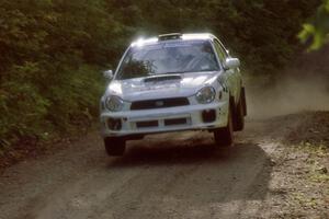 Jonathan Bottoms / Carolyn Bosley Subaru WRX catches air on a jump on SS13, Indian Creek.