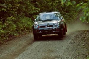 Dave Anton / Andrew Coombs Subaru WRX STi catches air on a jump on SS13, Indian Creek.